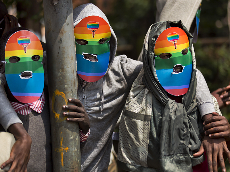 Kenyan gays, lesbians and advocates wear masks to preserve their anonymity as they stage a rare protest, opposing many African nations’ tough stances against homosexuality in Nairobi, Kenya, on Feb. 10, 2014. The National Gay and Lesbian Human Rights Commission in Kenya petitioned the High Court on Feb. 22, 2018, that sections of the penal code are in breach of the constitution and deny basic rights by criminalizing consensual same-sex relations between adults. (AP Photo/Ben Curtis)