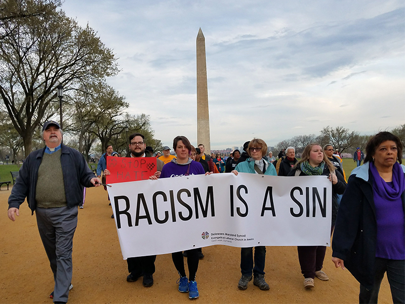 Participants in the A.C.T. to End Racism Rally walk along the National Mall on April 4, 2018, the 50th anniversary of the assassination of the Rev. Martin Luther King Jr. RNS photo by Adelle M. Banks