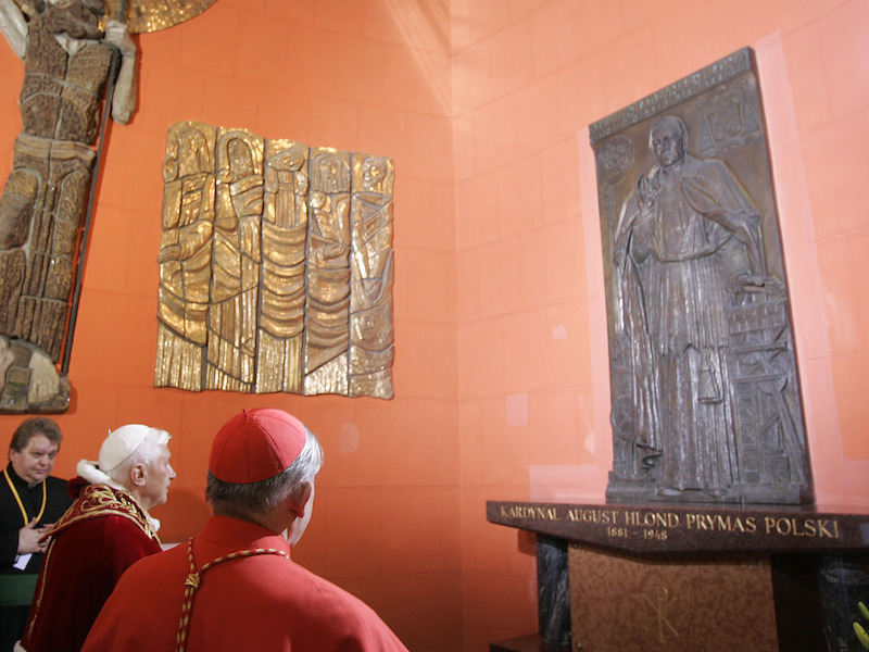 Pope Benedict XVI visits the tomb of Polish Cardinal August Hlond in Warsaw's St. John Cathedral on May 25, 2006. A leading Jewish organization on May 23, 2018, criticized the Vatican's decision to move Hlond along the path to possible sainthood, saying he was 
