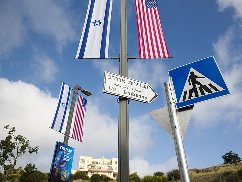 A road sign leading to the U.S. Embassy is seen ahead the official opening in Jerusalem, on May 13, 2018. Monday's opening of the U.S. Embassy in contested Jerusalem, cheered by Israelis as a historic validation, is seen by Palestinians as an in-your-face affirmation of pro-Israel bias by President Trump and a new blow to frail statehood dreams. (AP Photo/Ariel Schalit)