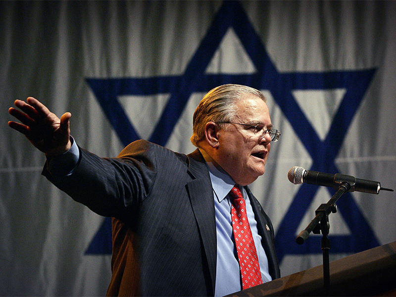 Texas evangelist John Hagee, of Christians United for Israel, addresses a crowd of his followers and Israeli supporters at a rally at the Jerusalem convention center on April 6, 2008. (AP Photo/Sebastian Scheiner)