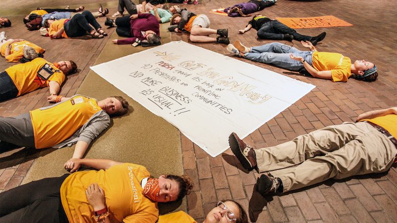 Friends of Fossil Free PCUSA symbolically portray deaths over the next two years in protest of General Assembly 223 voting to not immediately divest from the fossil fuel industry on June 22, 2018, in St. Louis. Photo by Danny Bolin/PC(USA)