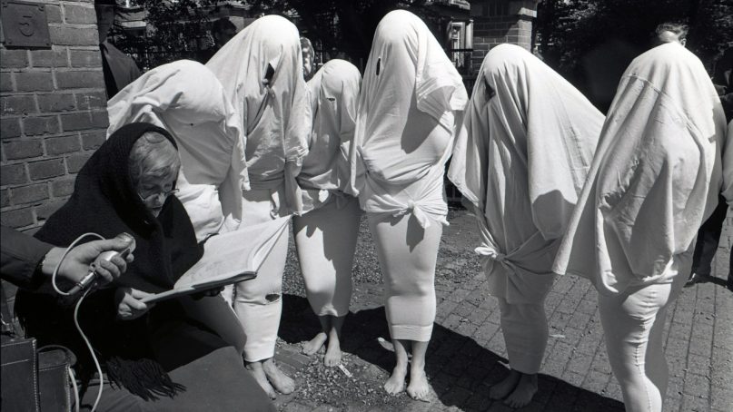 People dress as sperm cells at the Papal Nuncio building in The Hague for the sixth birthday of the encyclical, ‘Humanae Vitae’ in 1974.  Photo courtesy of Creative Commons