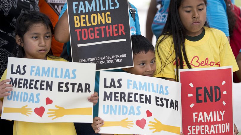 A group of children hold up signs during a demonstration in front of the Immigration and Customs Enforcement (ICE) offices, on June 1, 2018, in Miramar, Fla. The children were taking part in the Families Belong Together Day of Action, where demonstrators in cities across the U.S. protested against separating immigrant children from their families. (AP Photo/Wilfredo Lee)