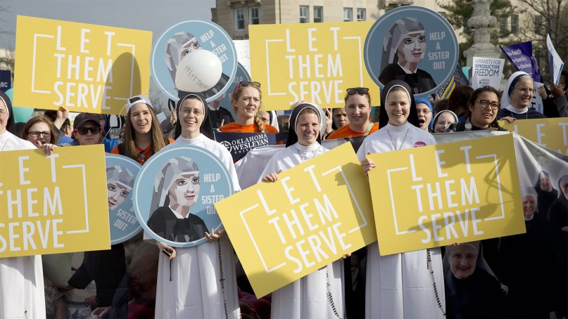 Nuns and their supporters rally outside the Supreme Court in Washington, D.C., on March 23, 2016, as the court hears arguments to allow birth control in health care plans in the Zubik vs. Burwell case. (AP Photo/Jacquelyn Martin)