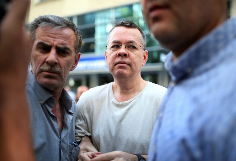 Andrew Craig Brunson, an evangelical pastor from Black Mountain, N.C., arrives at his house in Izmir, Turkey, on July 25, 2018. After being jailed in Turkey for more than a year and a half on terror and espionage charges, Brunson was released Wednesday and placed under house arrest as his trial continues. The 50-year-old pastor was let out of jail to serve home detention because of health problems, Turkey's official Anadolu news agency said. (AP Photo/Emre Tazegul)