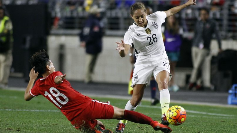 The United States' Jaelene Hinkle, right, handles the ball during an international friendly soccer match against China, in Glendale, Ariz., on Dec. 13, 2015. Hinkle revealed she decided not to play for the U.S. women's national team last year because her Christian faith prevented her from wearing a jersey that commemorated LGBTQ Pride Month. Hinkle revealed the reason for her decision last June in an interview posted May 30, 2018, on The 700 Club website. (AP Photo/Ralph Freso)