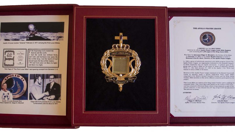 The microform copy of the Apollo 14 lunar-landed King James Bible and other related items available for auction. Image courtesy Nate D. Sanders Auctions