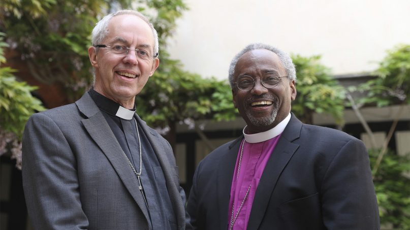 Archbishop of Canterbury Justin Welby, left, and American Bishop Michael Curry pose for the media ahead of the wedding of Prince Harry and Meghan Markle at St. George's Chapel in Windsor, England, on May 18, 2018.  (Steve Parsons/Pool Photo via AP)