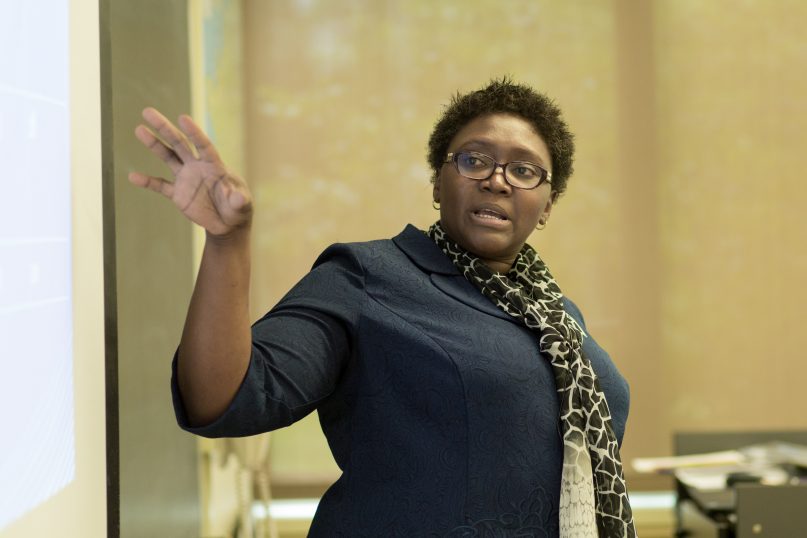 Adejoke Ayoola, nursing professor at Calvin College, shares insights from her research with attendees of CICW's inaugural <a href=