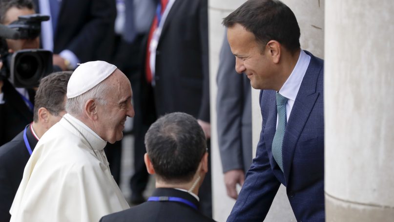 Pope Francis meets with Irish Prime Minister Leo Varadkar, right, as he arrives at Dublin Castle, Ireland, Saturday, Aug. 25, 2018. Pope Francis is on a two-day visit to Ireland. (AP Photo/Matt Dunham)