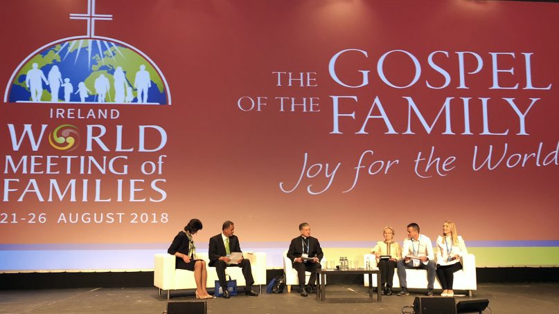 Cardinal Blase Cupich, center, leads a panel at the World Meeting of Families 2018 in Dublin on Aug. 23, 2018. RNS photo by Christine A. Scheller
