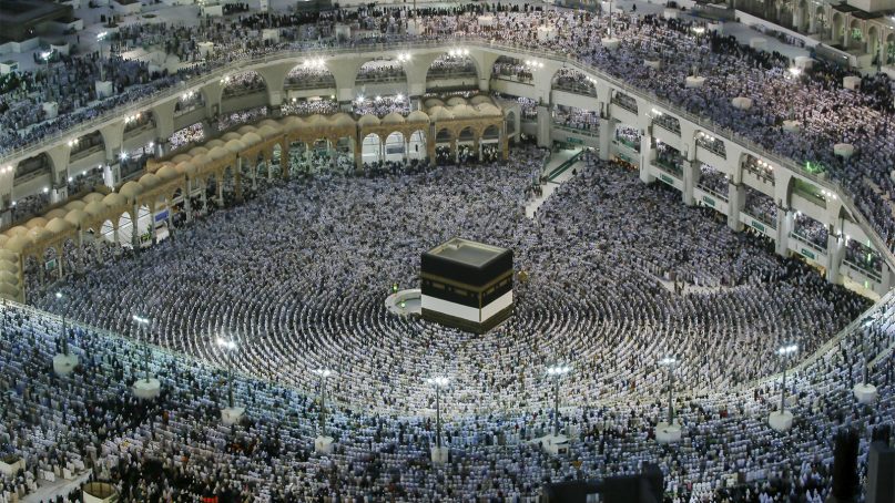 Muslim pilgrims pray around the Kaaba at the Grand Mosque, ahead of the annual Hajj pilgrimage in the Muslim holy city of Mecca, Saudi Arabia, on Aug. 16, 2018. The Islamic pilgrimage draws millions of visitors each year, making it the largest annual gathering of people in the world. (AP Photo/Dar Yasin)