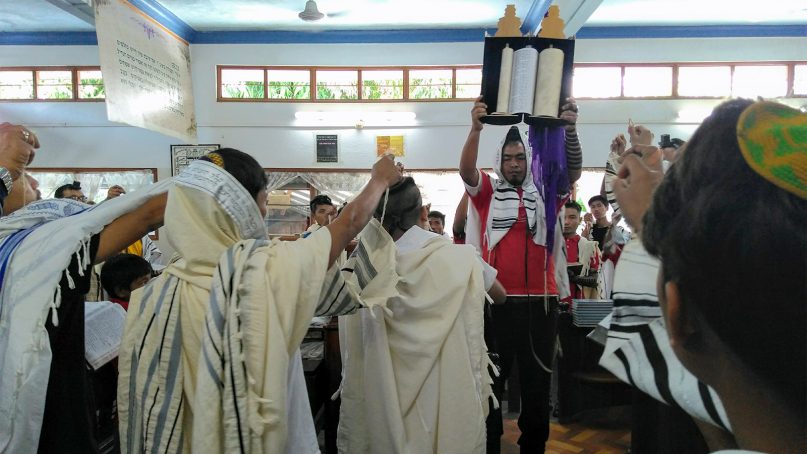 Bnei Menashe devotees offer prayers during a Torah service at the Beit Shalom Synagogue in Manipur, India, on Aug. 16, 2018. RNS photo by Priyadarshini Sen