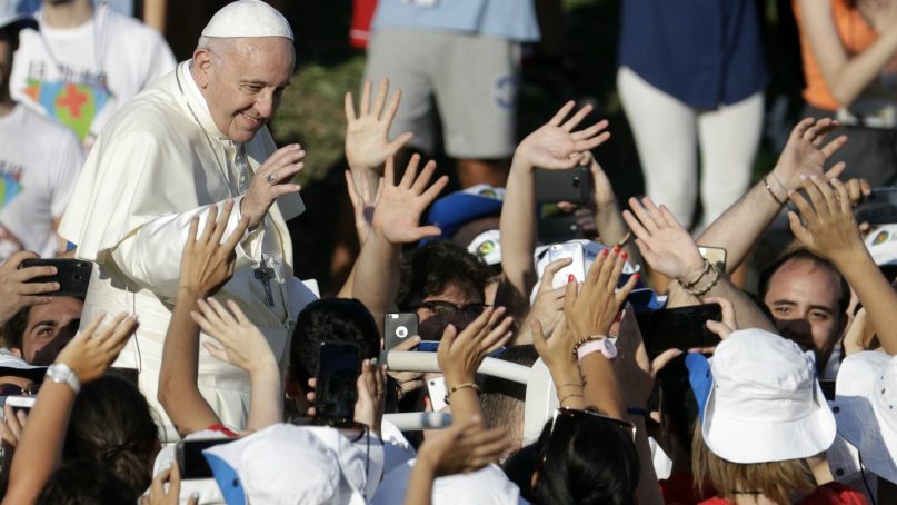 Pope Francis arrives at Rome's Circus Maximus to lead an evening prayer vigil with youths on Aug. 11, 2018. Thousand of youths gathered for the meeting with the pontiff in preparation for the next World Youth Day that will be held in Panama next year. (AP Photo/Andrew Medichini)
