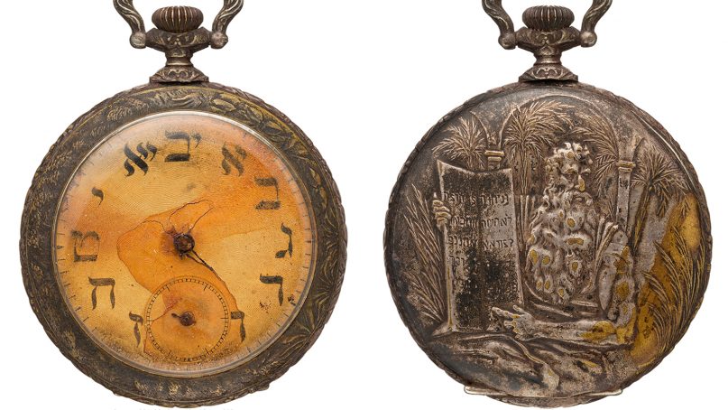 The face and back of the pocket watch Russian immigrant Sinai Kantor had during the Titanic voyage in 1912. The face has Hebrew letters and the back features Moses holding the Ten Commandments.  Photo courtesy Heritage Auctions,  HA.com