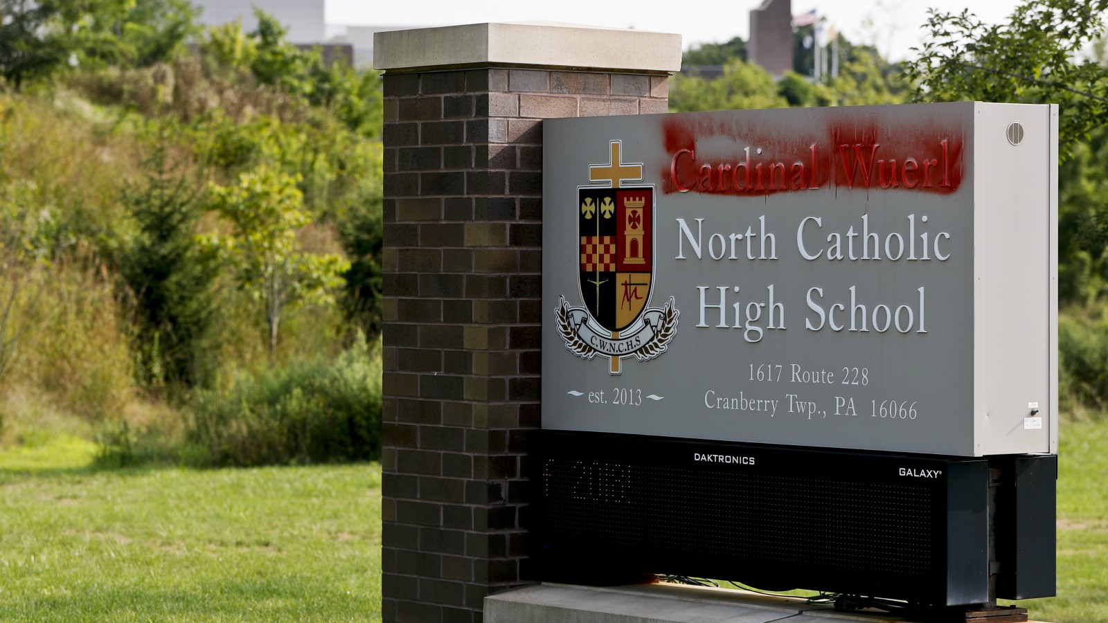 School drops archbishop’s name amid sex abuse report fallout