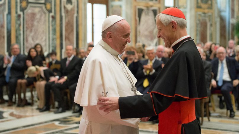 In this April 17, 2015, file photo, Pope Francis, left, talks with Papal Foundation Chairman Cardinal Donald Wuerl, archbishop of Washington, D.C., during a meeting with members of the Papal Foundation at the Vatican. On Aug. 14, 2018, a Pennsylvania grand jury accused Wuerl of helping to protect abusive priests when he was Pittsburgh's bishop. (L'Osservatore Romano/Pool Photo via AP)