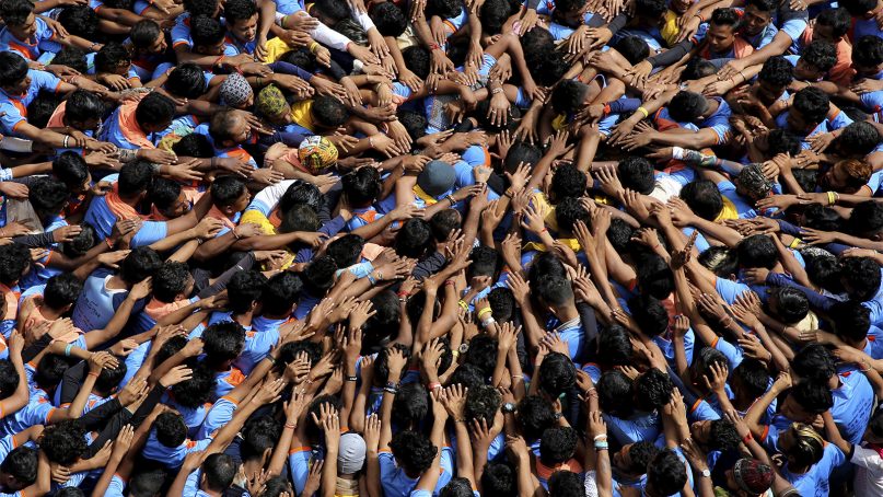 Indian youth form a human pyramid to break the 