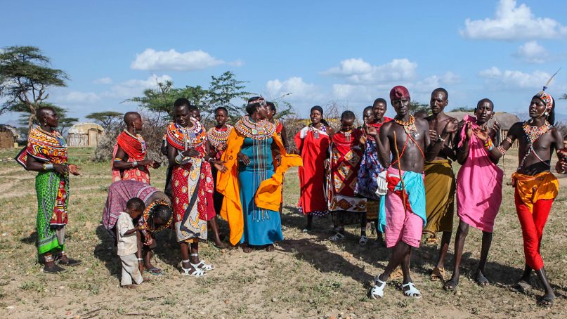 Samburu people mingle near their village in northern Kenya in 2013.  Photo by Ninara/Creative Commons