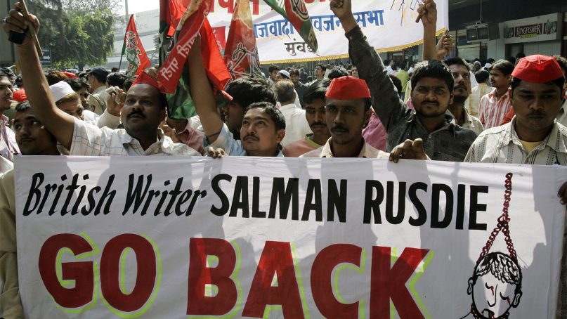 Samajwadi Party workers protest against writer Salman Rushdie at Chatrapati Shivaji International Airport in Mumbai, India, on Jan. 24, 2008. The Indian-born British writer has visited Bombay, several times and his trips have always attracted protests from Muslim groups. (AP Photo/Rajesh Nirgude)