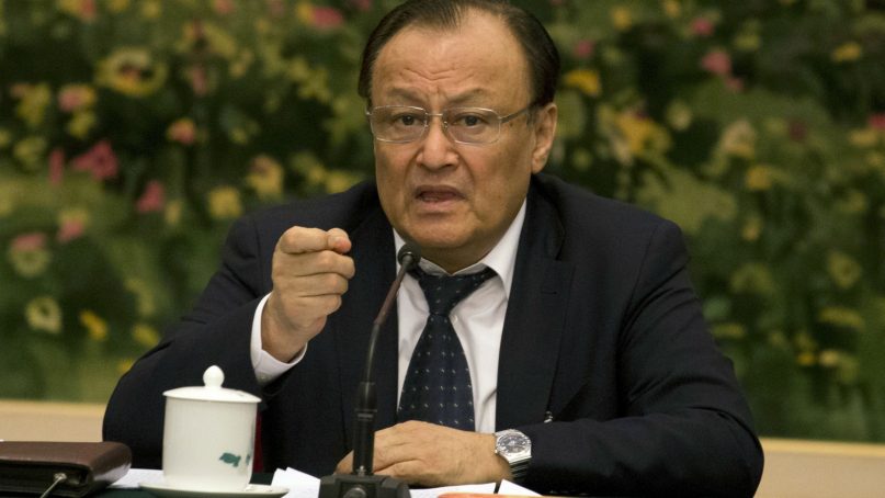 Shohrat Zakir, chairman of the Xinjiang Uyghur Autonomous Region, speaks on the sideline of the National People's Congress in Beijing on March 12, 2017. China's ruling Communist Party is hardening its rhetoric about Islam, with top officials making repeated warnings this past week about the specter of global religious extremism seeping into the country. (AP Photo/Ng Han Guan)
