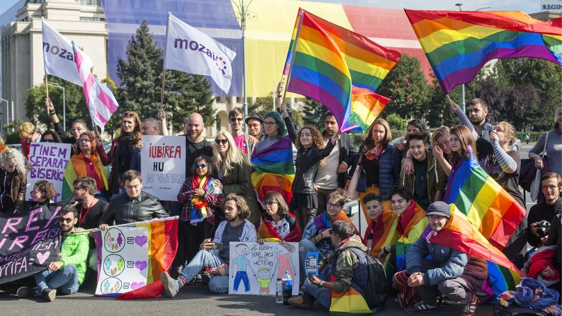 LGBT advocates demonstrate against a constitutional referendum in Bucharest, Romania, on Sept. 30, 2018. “Because the interests behind this referendum are other than the well-being of the Romanian society and families in their diversity, this campaign has brought forward the ugliest facets of Romanian politics and power-hungry churches,