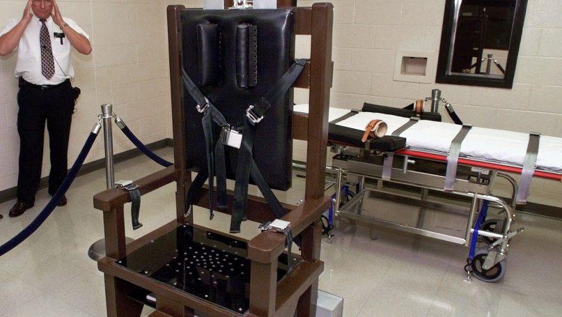 In this Oct. 13, 1999, file photo, Ricky Bell, then the warden at Riverbend Maximum Security Institution in Nashville, Tenn., gives a tour of the prison's execution chamber. (AP Photo/Mark Humphrey, File)