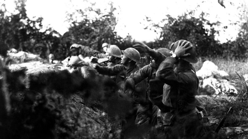 American soldiers on the Piave front throw hand grenades toward the Austrian trenches, near Varage, Italy, on Sept. 16, 1918, during World War I. Photo by Sgt. A. Marcioni/Creative Commons