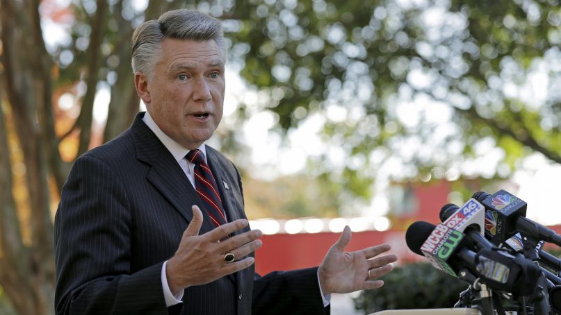 Mark Harris speaks to the media during a news conference in Matthews, N.C., on Nov. 7, 2018. Harris is leading Dan McCready for the 9th Congressional District in a race that is still too close to call. (AP Photo/Chuck Burton)