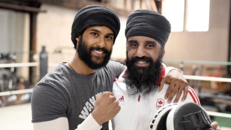 Indo-Canadian actor Prem Singh, left, potrays boxer Pardeep Singh Nagra in the film “Tiger.” Photo courtesy of R3M Productions