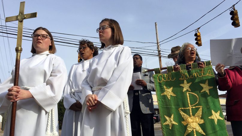 Acolytes and a crucifer from St. Ambrose Episcopal Church stand outside All Saints' Episcopal Church in Warrenton, N.C., during a closing service on Dec. 8, 2018. RNS photo by Yonat Shimron
