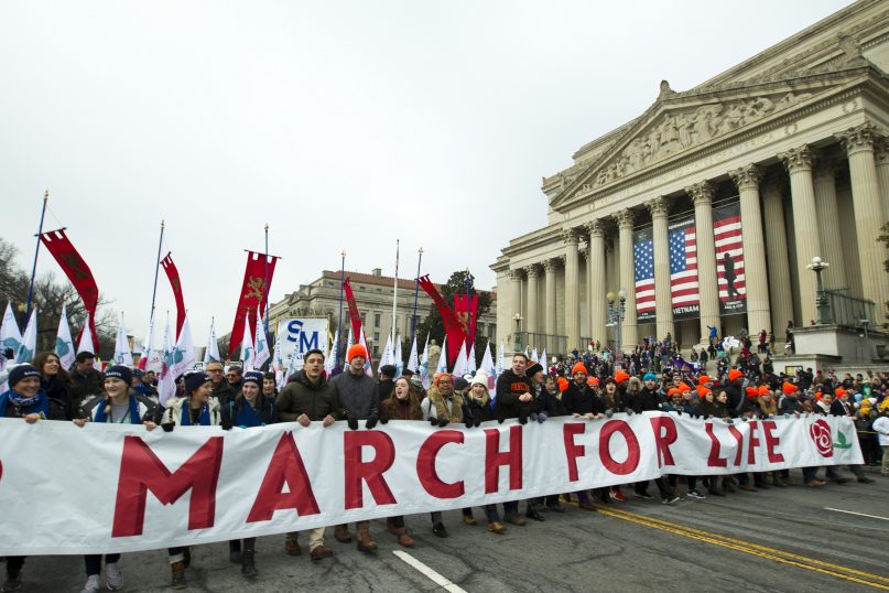 Anti-abortion activists march towards the U.S. Supreme Court during the annual March for Life in Washington, D.C., on Jan. 18, 2019. (AP Photo/Jose Luis Magana)