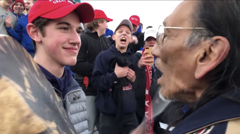 Screengrab from a viral video showcasing a confrontation between a Native American drummer and a group of Catholic high school students in Washington, D.C., on Jan. 18, 2019. Screenshot via YouTube