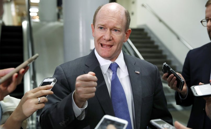 Sen. Chris Coons, D-Del., speaks to reporters after leaving a briefing of the full Senate by Deputy Attorney General Rod Rosenstein, amid controversy over President Donald Trump's firing of FBI Director James Comey, a the Capitol, on May 18, 2017, in Washington.  (AP Photo/Jacquelyn Martin)