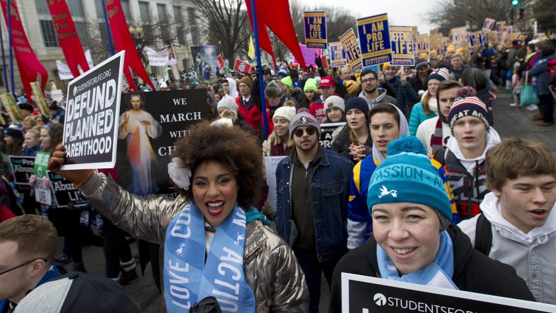 Anti-abortion activists march toward the U.S. Supreme Court during the annual March for Life in Washington on Jan. 18, 2019. (AP Photo/Jose Luis Magana)