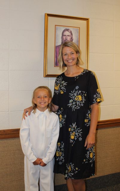 Guest blogger Kristin Lowe with one of her five children at her baptism, July 2018.
