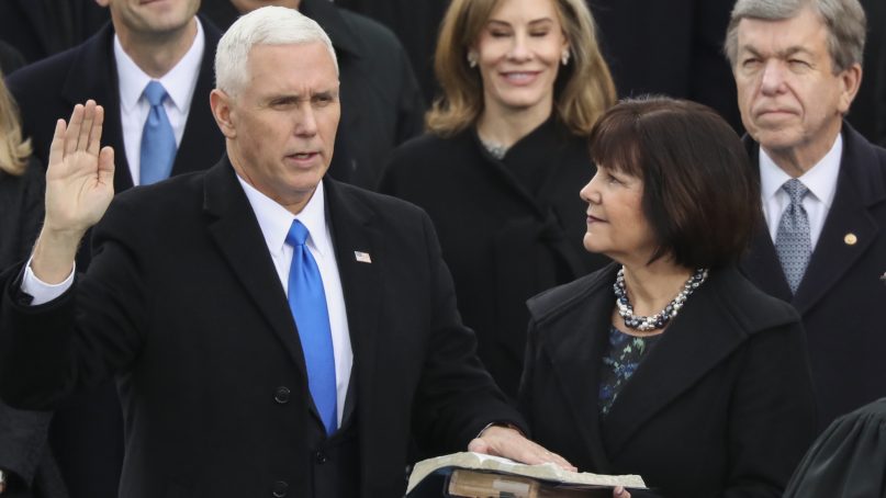 Vice President Mike Pence is sworn in by Justice Clarence Thomas as this wife Karen holds the bible during the 58th Presidential Inauguration at the U.S. Capitol in Washington, Friday, Jan. 20, 2017. (AP Photo/Andrew Harnik)