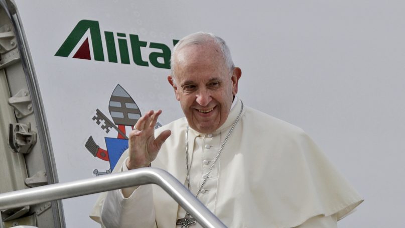 Pope Francis boards the airplane on the occasion of the first ever trip to United Arab Emirates at Rome's Fiumicino International airport, Sunday, Feb. 3, 2019. (AP Photo/Gregorio Borgia)