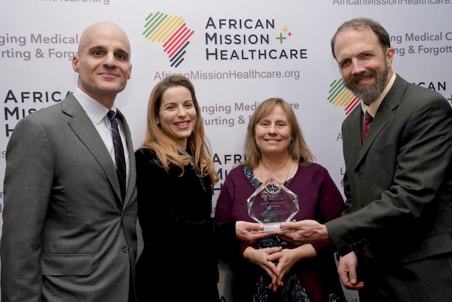 New York philanthropists Mark Gerson, and his wife Rabbi Erica Gerson, who established the annual AMH Gerson L’Chaim Prize for Outstanding Christian Medical Missionary Service, jointly presented the 2018 award to SIM Missionary Dr. Rick Sacra at a private dinner in New York City Jan. 31. Dr. Sacra received the honor for dedicating his life to medical missionary work in Africa. Mr. Gerson is also co-founder and chairman of Gerson Lehrman Group.