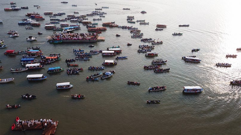 Boaters ride along the Papaloapan River during the annual Virgin de la Candelaria procession in Tlacotalpan, Veracruz, on Feb. 2, 2019. RNS photo by Irving Cabrera Torres