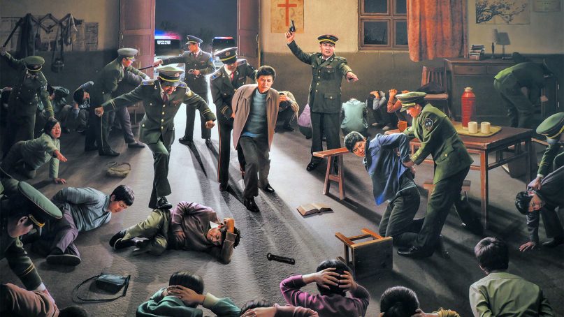 A painting depicting the persecution of the Church of Almighty God by Chinese authorities is displayed inside a CAG church in Seoul, South Korea, where many members have fled from China in recent years seeking asylum. RNS photo by Thomas Maresca
