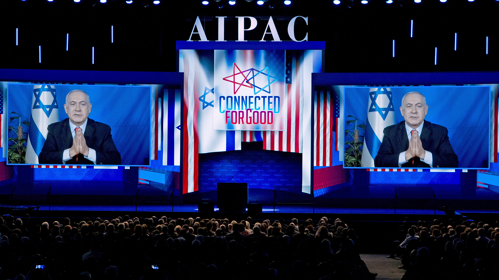 Israeli Prime Minister Benjamin Netanyahu speaks via video from Israel to the 2019 American Israel Public Affairs Committee (AIPAC) policy conference, at Washington Convention Center, in Washington, on March 26, 2019. (AP Photo/Jose Luis Magana)