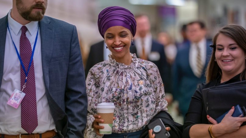 Rep. Ilhan Omar, D-Minn., walks through an underground tunnel at the Capitol as top House Democrats plan to offer a measure that condemns anti-Semitism in the wake of controversial remarks by the freshman congresswoman, in Washington, on March 6, 2019. Omar said last week that Israel's supporters are pushing U.S. lawmakers to take a pledge of 