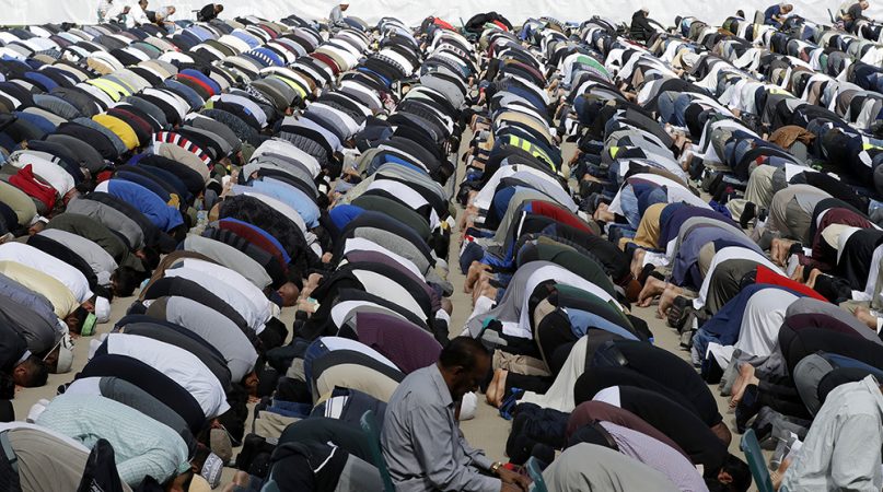 Muslims pray during Friday prayers at Hagley Park in Christchurch, New Zealand, on March 22, 2019. People across New Zealand observed the Muslim call to prayer as the nation reflected on the 50 people who were slaughtered at two mosques on March 15. (AP Photo/Mark Baker)