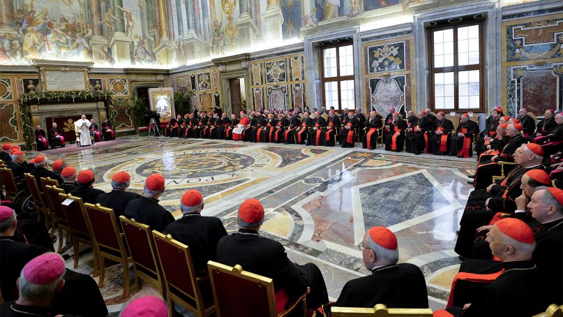 Pope Francis talks during an audience with the Roman Curia in the Clementina hall at the Vatican on Dec. 22, 2014. (AP Photo/Andreas Solaro, Pool)