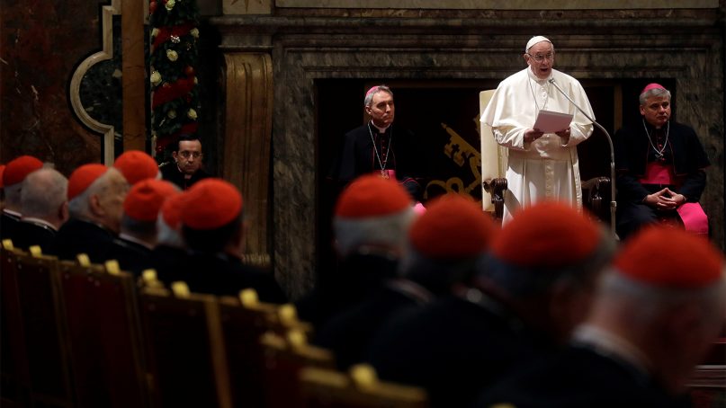 Pope Francis speaks during the traditional greetings to the Roman Curia in the Sala Clementina (Clementine Hall) of the Apostolic Palace at the Vatican on Dec. 22, 2016. (AP Photo/Gregorio Borgia, Pool)