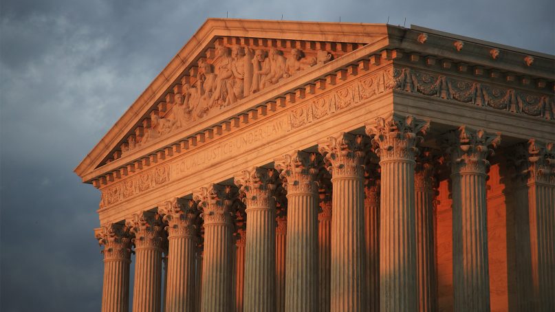 The U.S. Supreme Court is seen at sunset in Washington on Oct. 4, 2018. The Supreme Court is telling California that it can’t enforce coronavirus-related restrictions that have limited home-based religious worship including Bible studies and prayer meetings. The order from the court late Friday, April 9, 2021, is the latest in a recent string of cases in which the high court has barred officials from enforcing some coronavirus-related restrictions applying to religious gatherings. (AP Photo/Manuel Balce Ceneta)