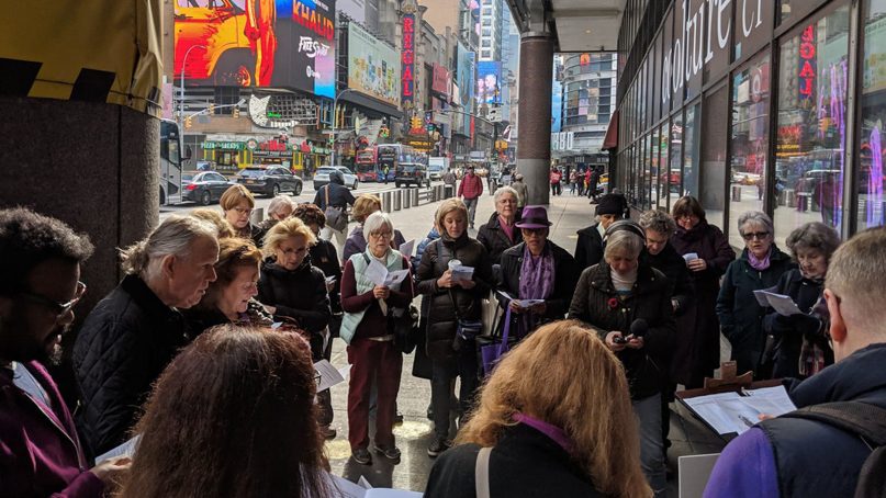 A group led by Rev. Adrian Dannhauser, who chairs the Episcopal Diocese of New York’s Taskforce Against Human Trafficking, participates in a Stations of the Cross ceremony at the New York Port Authority on April 6. RNS photo by Rosie Dawson. 