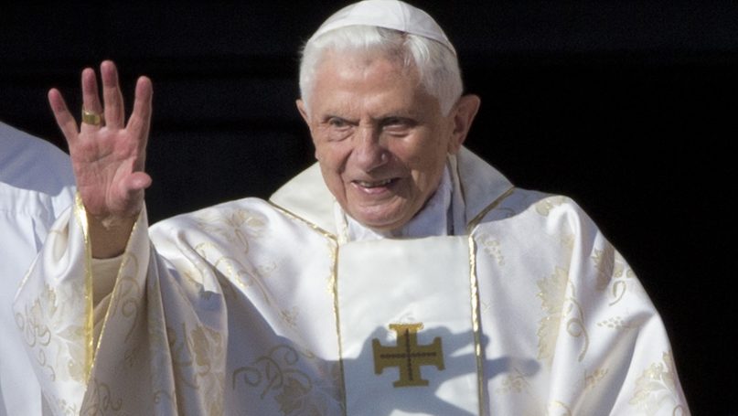 This Oct. 19, 2014, file photo shows Pope Emeritus Benedict XVI arriving in St. Peter's Square at the Vatican to attend the beatification ceremony of Pope Paul VI, and a Mass for the closing of a two-week synod on family issues, celebrated by Pope Francis. A German newspaper that quoted letters by Benedict XVI hitting back at criticism of his 2013 resignation says he was responding to a conservative German cardinal who took issue with his decision to take the title 